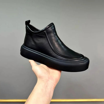 Handmade men's high-top Chelsea boots.