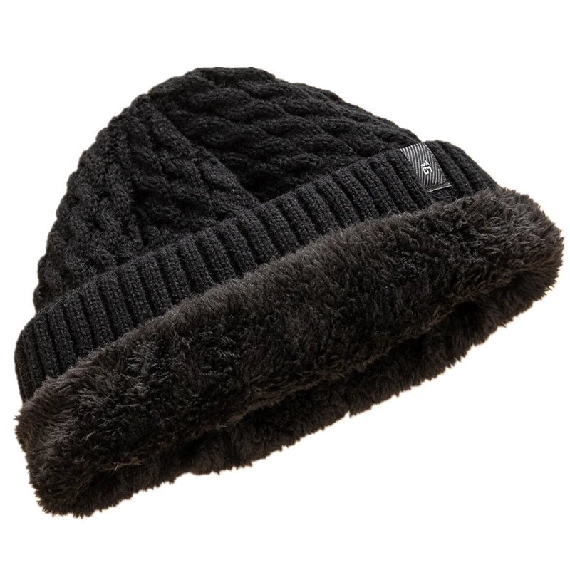 Knitted hat with faux fur lining.