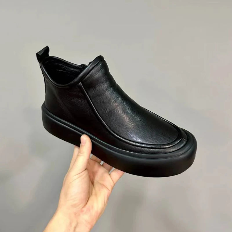 Handmade men's high-top Chelsea boots.