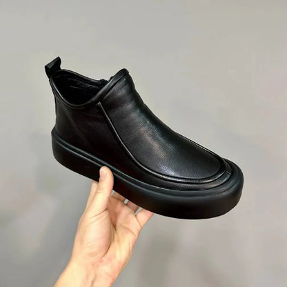 Handmade men's high-top Chelsea boots.