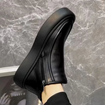 Handmade men's high-top Chelsea boots.