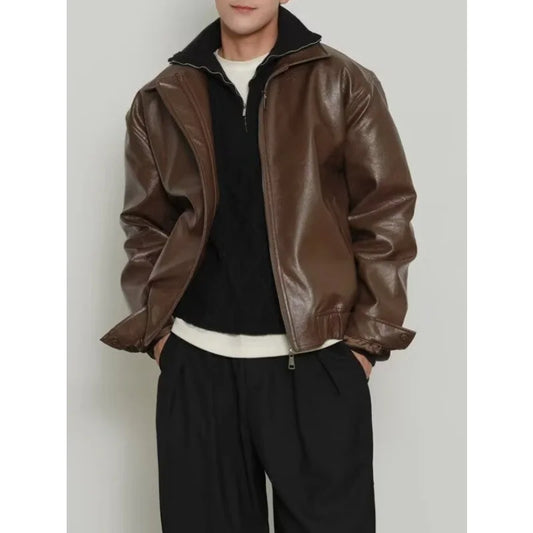Loose-fitting leather motorcycle jacket.