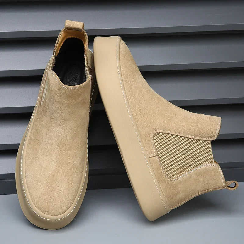 Chelsea boots made of leather.