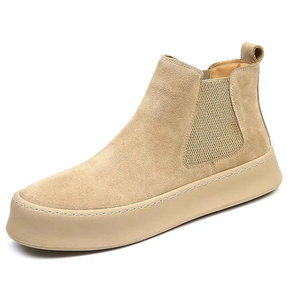 Chelsea boots made of leather.