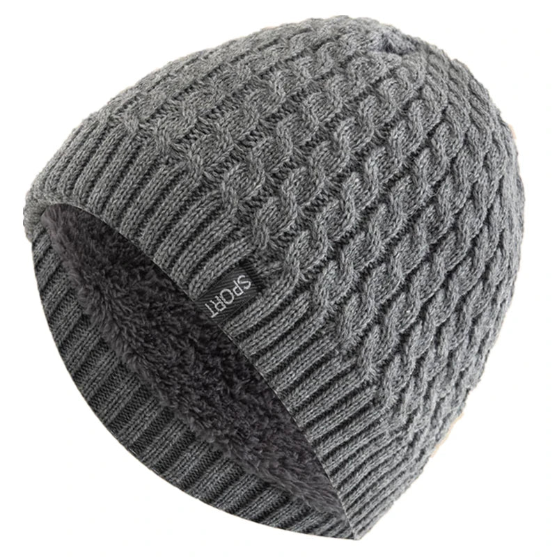 Knitted hat with faux fur lining.