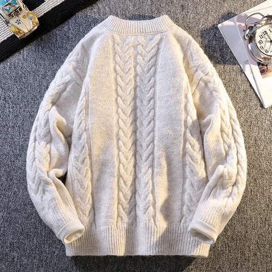 Knitted sweater with buttons.