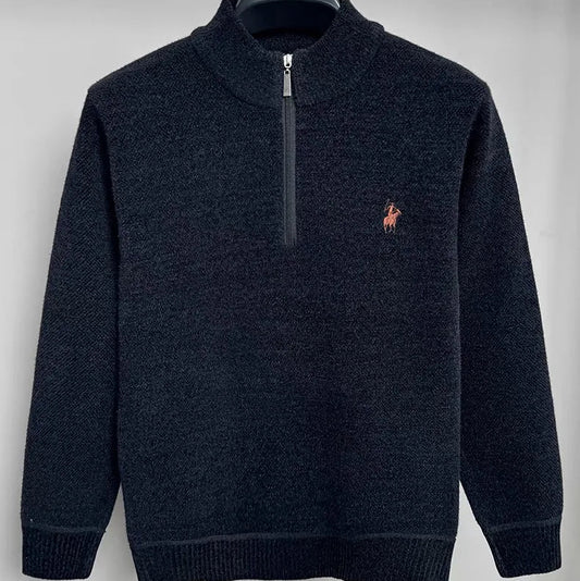 Knitted sweater with a half-zip closure.